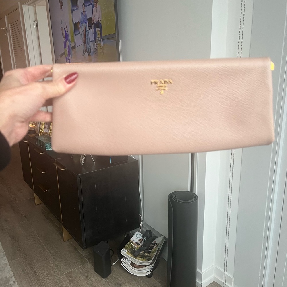 Prada nude leather clutch.